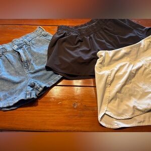 3 shorts: 1 American Eagle Outfitters Women's Shorts - Blue, Black, and Cream